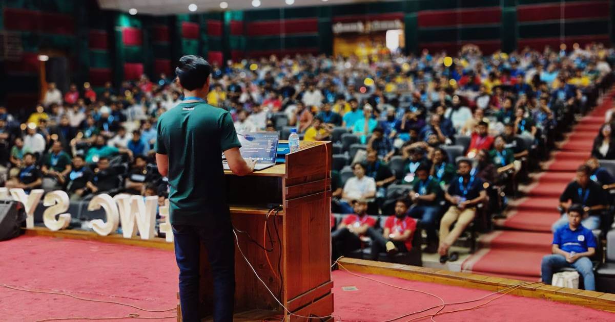 Sumit Saha speaking at WordCamp Sylhet 2024